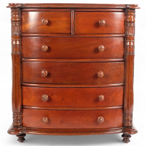 8 - A large 19th century mahogany apprentice-piece table-top bow-front chest of drawers, 2 short and 4 l... 