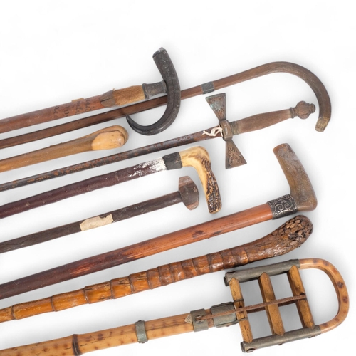 83 - A quantity of Antique walking sticks, ceremonial sword, bamboo shooting stick, etc (9)