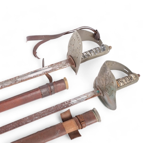 85 - 2 British military Infantry Officer's swords, comprising George V and George VI, both with scabbards... 