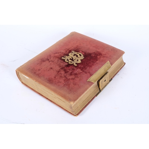 91 - A 19th century velvet covered photograph album, containing various family and Royal portraits