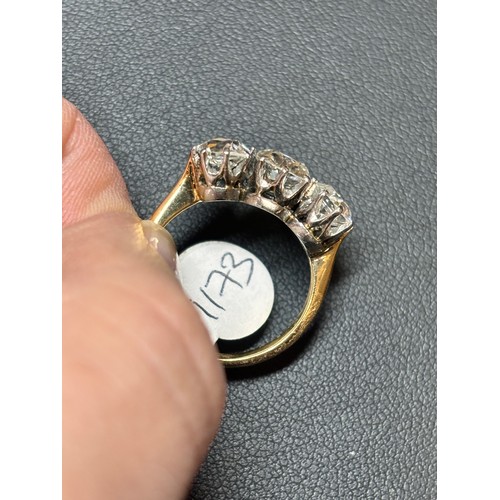 1173 - An 18ct gold three stone diamond ring, set with 3 old-cut diamonds totally approximately 2.4ct (0.9 ... 