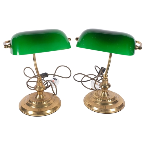 423 - A pair of embossed brass adjustable banker's table-top lamps with green shades, H34cm