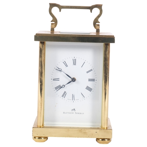 426 - A Swiss brass-cased carriage clock, by Matthew Norman, H17cm including handle