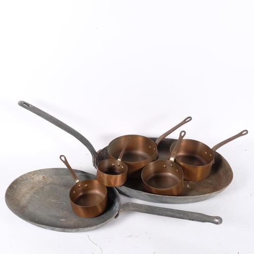 446 - A graduated set of 5 Antique copper saucepans, largest 18cm, and 2 other pans