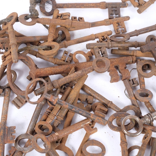 451 - A box of Antique keys, including early door keys, largest 15cm