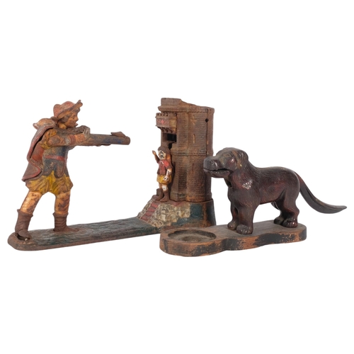 458 - A cast-iron dog figure nutcracker, and a mechanical cast-iron William Tell money box, L26cm