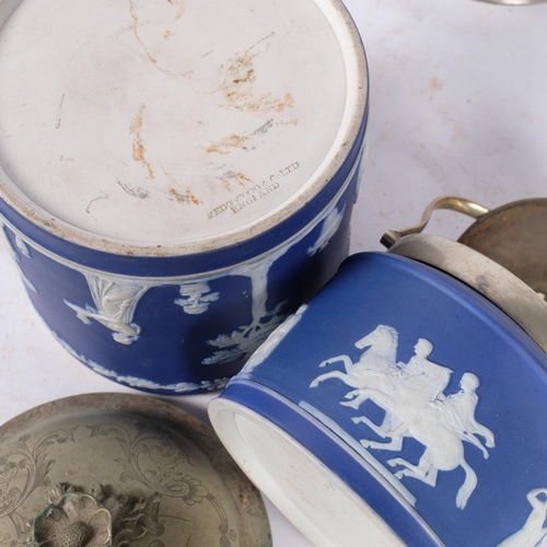 459 - A Wedgwood dark blue Jasperware teapot with plated cover and mount, and 3 jars with plated covers, t... 