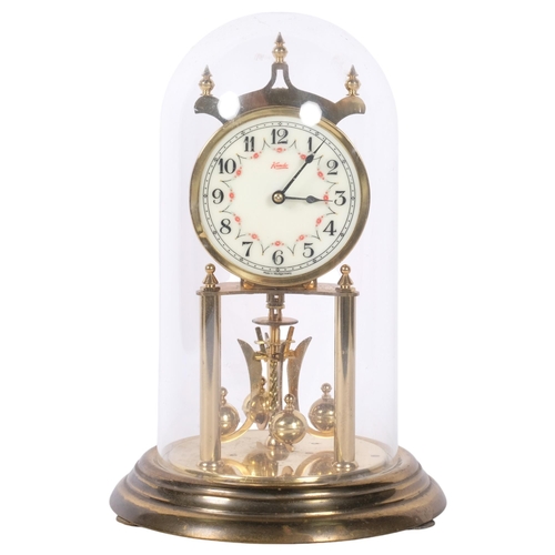 469 - Kundz 400-day brass clock, under plastic dome, H29cm