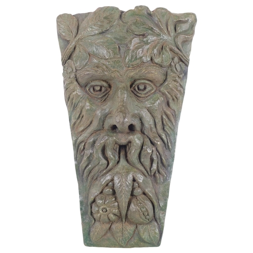 481 - A moulded concrete Green Man plaque, with hanger, H39cm