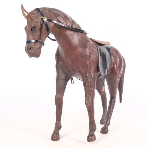 623 - A leather horse figure, H28cm