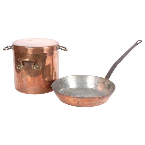 625 - Antique copper 2-handled pot with cover, H27cm, and a large copper frying pan with iron handle