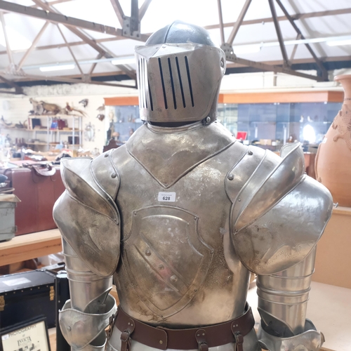 628 - A reproduction ornamental polished aluminium suit of armour, with leather belt, boots and visor, lif... 