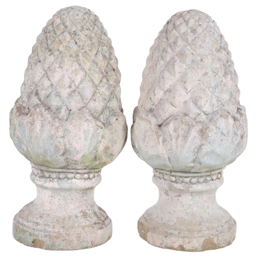 637 - A pair of concrete pineapple design finials, H30cm