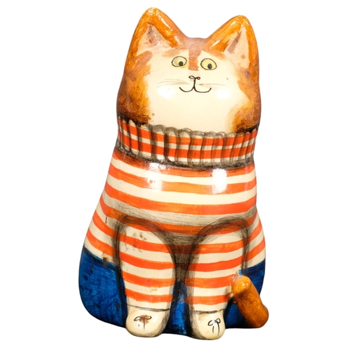 648 - JOAN & DAVID DE BETHEL - a painted papier mache 'Fred' seated cat figure, with red and white striped... 