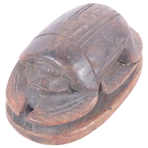 657 - Natural History - An Egyptian carved stone scarab beetle, length 9.5cm