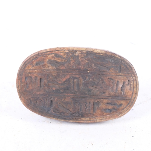 657 - Natural History - An Egyptian carved stone scarab beetle, length 9.5cm