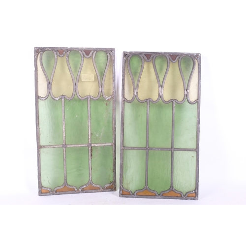 209 - A pair of Art Nouveau leadlight stained glass window panels, each 44cm x 24cm