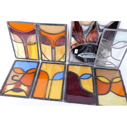 210 - A modern leadlight stained glass window panel, 58cm x 30cm, and 7 similar smaller panels (8)