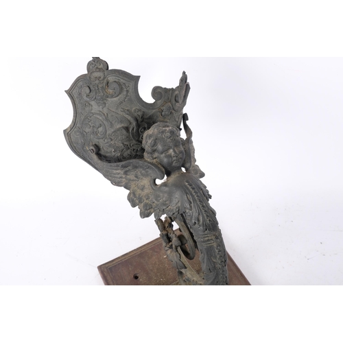 212 - An Antique Renaissance style metal wall bracket, plaque 33cm x 23cm