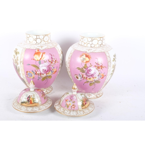 223 - A pair of Continental porcelain jars and covers, with painted lover decoration, H38cm