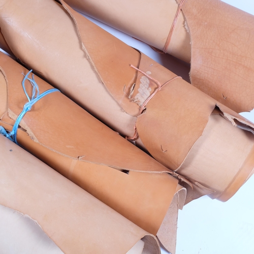 236 - A group of 4 rolls of leather, tan in colour, widest approx 100cm