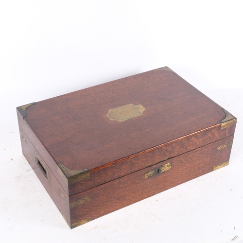 891 - A large 19th century brass-bound oak storage box, made of old oak taken from the furniture of the Pa... 