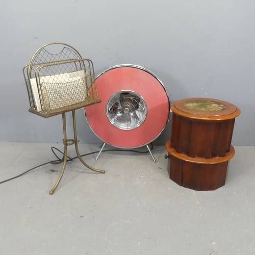 2733 - A 19th century brass magazine rack, H86cm. a mid-century fan heater and a commode. (3)