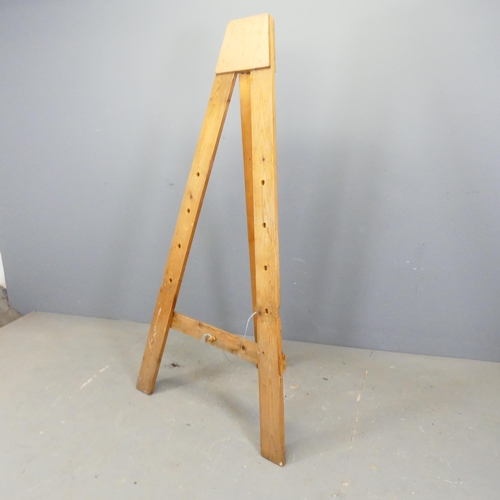 2741 - A pine A-frame artists easel. H155cm.