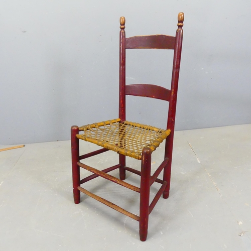 2751 - An early 19th century Canadian primitive chair with original paintwork and rawhide seat.