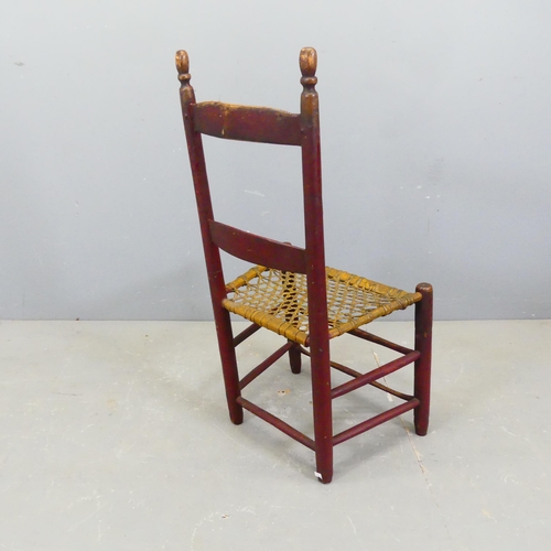 2751 - An early 19th century Canadian primitive chair with original paintwork and rawhide seat.