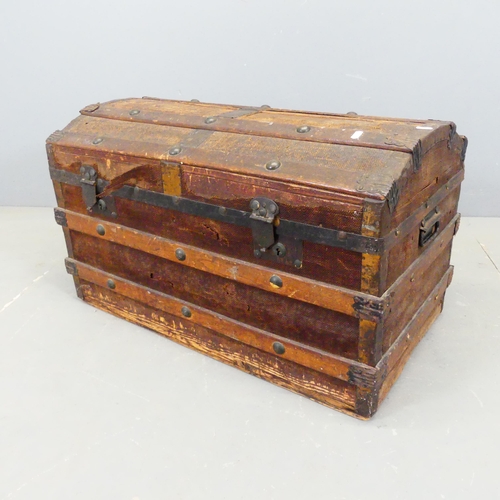 2763 - A Victorian metal bound dome-top pine trunk, with tray fitted interior. W77cm, H46cm, D45cm.