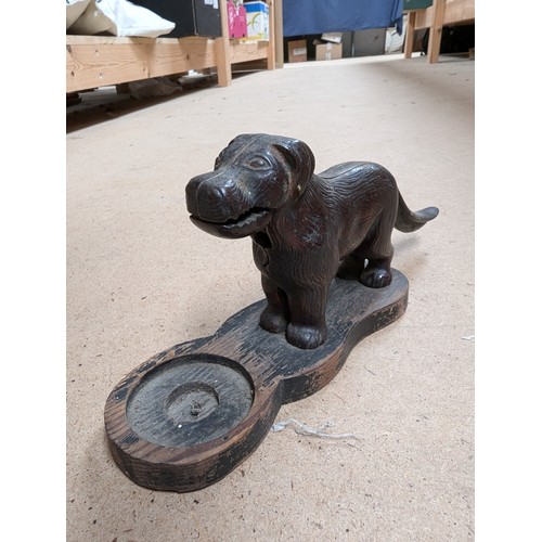 458 - A cast-iron dog figure nutcracker, and a mechanical cast-iron William Tell money box, L26cm