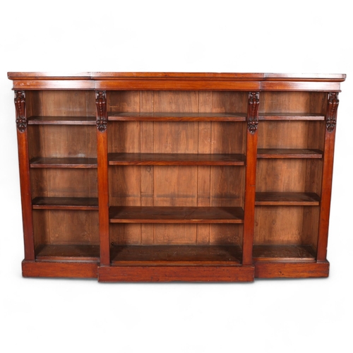 172 - Mid-Victorian mahogany break front bookcase, with scroll top column detail, height 119cm, width 185c... 