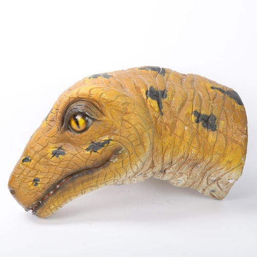 103 - A modern composition wall-mounted dinosaur head, length 63cm