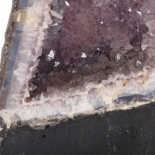 104 - A large purple amethyst cathedral geode, 22.7kg, height 78cm, width 22cm