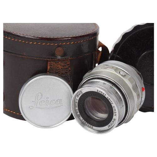 108 - A Leica Ernst Leitz GmbH Wetzlar Elmar F=9cm 1:4 NR 1387660 camera lens, with Leica lens caps and or... 