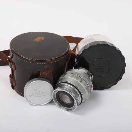 108 - A Leica Ernst Leitz GmbH Wetzlar Elmar F=9cm 1:4 NR 1387660 camera lens, with Leica lens caps and or... 