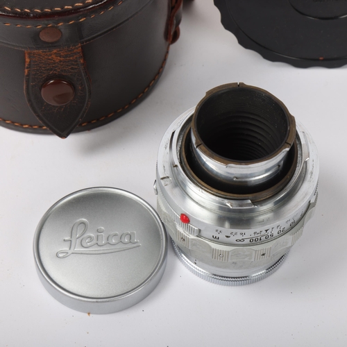 108 - A Leica Ernst Leitz GmbH Wetzlar Elmar F=9cm 1:4 NR 1387660 camera lens, with Leica lens caps and or... 