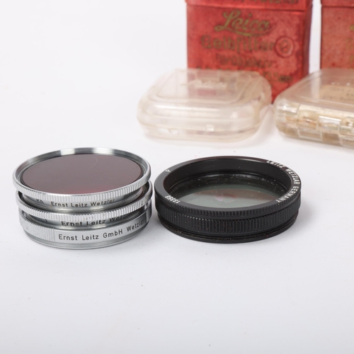 110 - PHOTOGRAPHY - a small group of E Leitz/Leica filters and cases