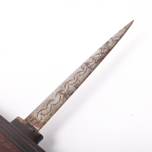 121 - Unusual 19th century dagger, African/Middle Eastern, with embossed and stepped leather handle and po... 