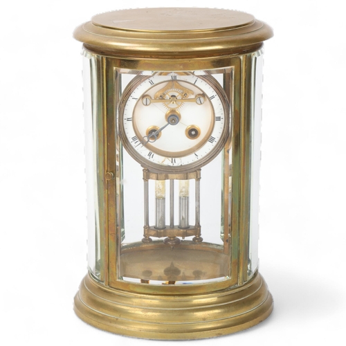 131 - A 19th century brass-cased oval 4-glass regulator clock, with curved bevel-glass panels and enamel d... 