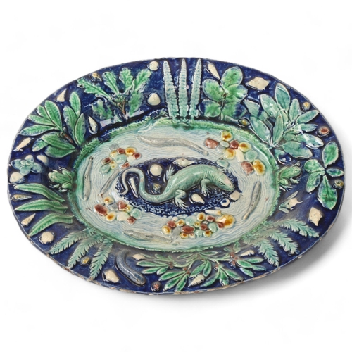 147 - 19th century Palissy style faience pottery bowl, relief lizard fish and frog decoration, in blue and... 