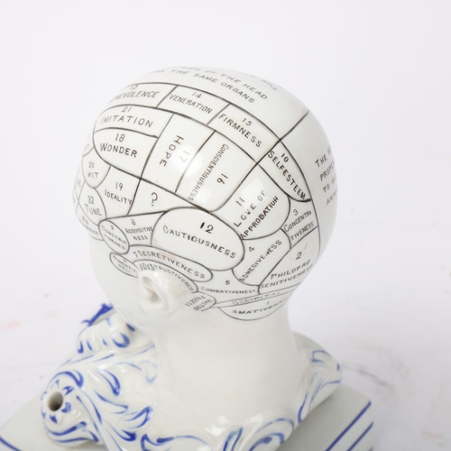 148 - A 19th century porcelain phrenology head inkwell, impressed F Bridges Phrenologist, height 14cm