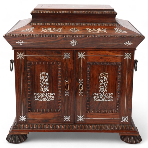 156 - A Victorian rosewood and mother-of-pearl inlaid sewing cabinet, with carved mouldings, hinged lid en... 