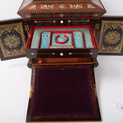 156 - A Victorian rosewood and mother-of-pearl inlaid sewing cabinet, with carved mouldings, hinged lid en... 