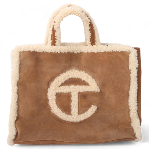 158 - UGG - sheepskin bag, length 37cm