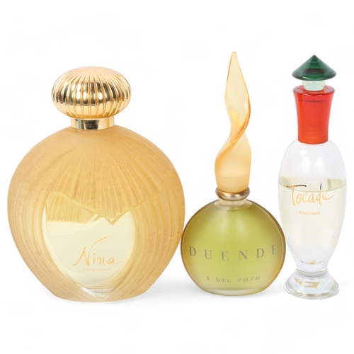 163 - NINA RICCI - a large display perfume bottle, height 18cm, and 2 other display bottles (3)