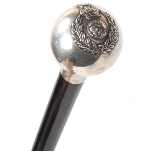 166 - Military swagger stick with silver top and crest, hallmarks Birmingham 1921