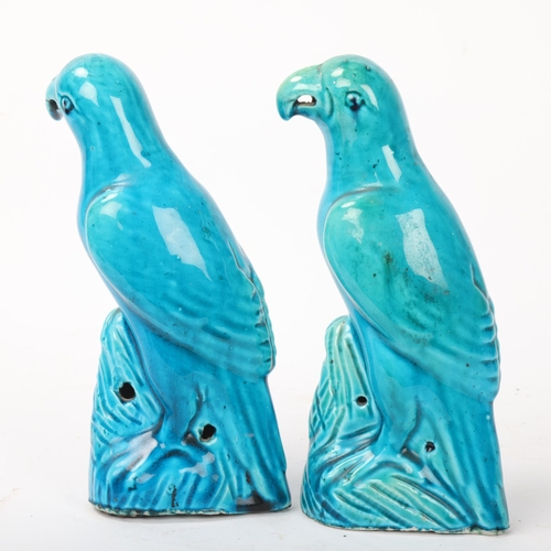 184 - A pair of Chinese turquoise glaze ceramic parakeets, height 20cm