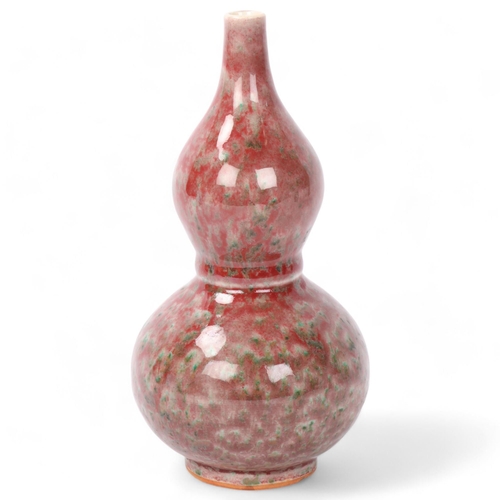 187 - A Chinese porcelain double-gourd vase, mottled sang de boeuf glaze, height 20cm